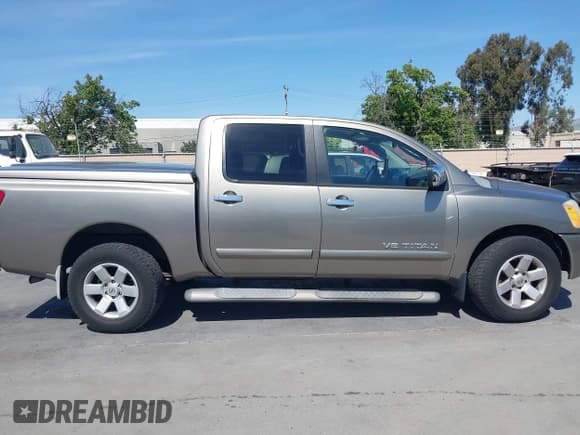 ✅ 2006 Nissan Titan LE • VIN: 1N6AA07B26N516829 • Lot: 42184783. Listed on IAAI with 142,678 mi. Free auction sales archive from the USA and detailed vehicle history report at DreamBid. Image 13.