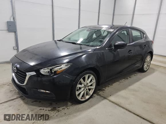 ✅ 2017 Mazda 3 Touring • VIN: 3MZBN1L35HM124485 • Лот: 66711135. Опубликован ранее на Copart с пробегом 119 626 миль. Бесплатный доступ к архиву аукционных продаж из США и подробный отчёт об истории автомобиля на DreamBid. Изображение 1.