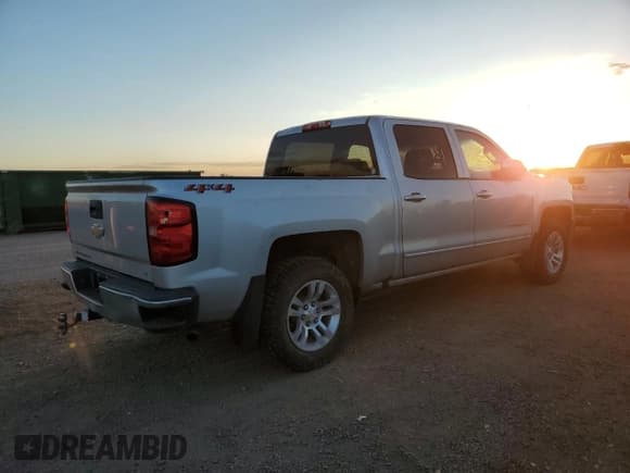 ✅ 2018 Chevrolet Silverado 1500 LT • VIN: 3GCUKREC6JG425562 • Лот: 82734105. Опубликован ранее на Copart с пробегом 143 221 миль. Бесплатный доступ к архиву аукционных продаж из США и подробный отчёт об истории автомобиля на DreamBid. Изображение 3.