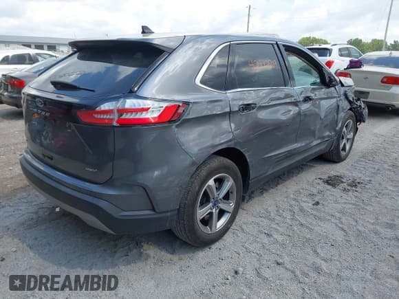 ✅ 2021 Ford Edge SEL • VIN: 2FMPK4J94MBA52017 • Лот: 42982719. Опубликован ранее на IAAI с пробегом 77 049 миль. Бесплатный доступ к архиву аукционных продаж из США и подробный отчёт об истории автомобиля на DreamBid. Изображение 4.