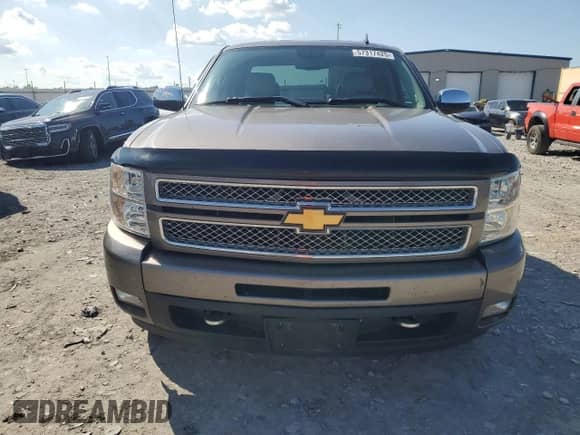 2012 Chevrolet Silverado 1500 LTZ с VIN 1GCRKTE70CZ219338, выставлен на аукционе Copart как лот 57317425 с пробегом 183 672 миль миль и Списание • Salvage title. История ставок и продаж доступна на DreamBid. Изображение 5.