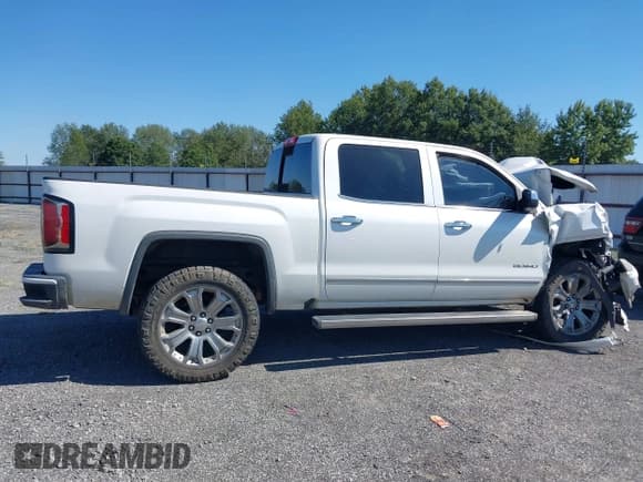 ✅ 2017 GMC Sierra 1500 Denali • VIN: 3GTU2PEJ0HG147836 • Lot: 43410221. Listed on IAAI with 98,619 mi. Free auction sales archive from the USA and detailed vehicle history report at DreamBid. Image 13.