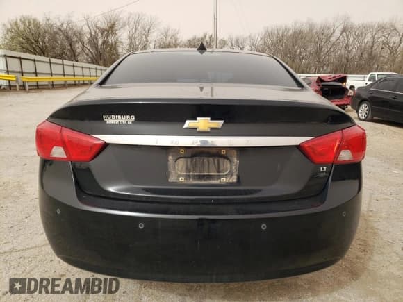 ✅ 2014 Chevrolet Impala LT • VIN: 2G1125S30E9266871 • Lot: 49011135. Listed on Copart with 165,215 mi. Free auction sales archive from the USA and detailed vehicle history report at DreamBid. Image 6.