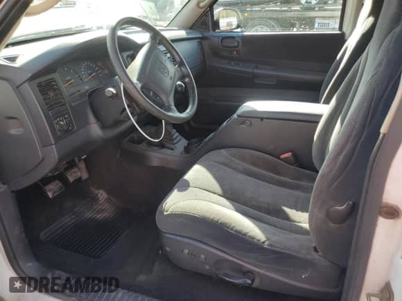 2001 Dodge Dakota z VIN 1B7GL22X21S162973, wystawiony jako Copart lot #76419754 z przebiegiem 135 707 mil mil oraz Czysty tytuł • Clean title. Historia ofert i sprzedaży dostępna na DreamBid. Obrazek 7.