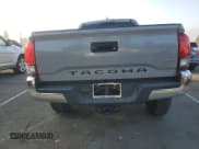 ✅ 2018 Toyota Tacoma TRD Off Road • VIN: 3TMDZ5BN3JM039712 • Lot: 89657285. Listed on Copart with 79,609 mi. Free auction sales archive from the USA and detailed vehicle history report at DreamBid. Image 6.