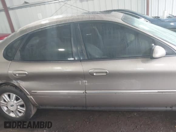 ✅ 2004 Ford Taurus SEL • VIN: 1FAFP56S34A134051 • Lot: 43245056. Listed on IAAI with 197,425 mi. Free auction sales archive from the USA and detailed vehicle history report at DreamBid. Image 13.