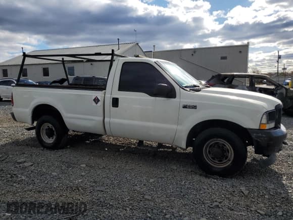 ✅ 2004 Ford F-250 • VIN: 1FDNF20L44EC48833 • Lot: 92880745. Listed on Copart with 314,602 mi. Free auction sales archive from the USA and detailed vehicle history report at DreamBid. Image 4.