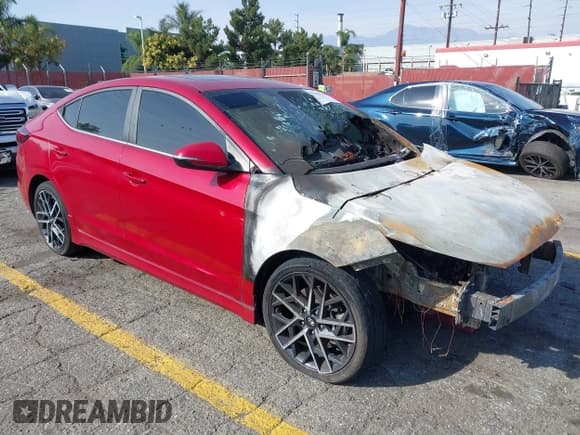 ✅ 2019 Hyundai Elantra Sport • VIN: KMHD04LB1KU860759 • Lot: 43603334. Listed on IAAI with Not provided. Free auction sales archive from the USA and detailed vehicle history report at DreamBid. Image 1.
