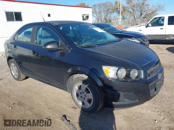 ✅ 2014 Chevrolet Sonic LS • VIN: 1G1JA5SH0E4214903 • Lot: 43633449. Listed on IAAI with 68,732 mi. Free auction sales archive from the USA and detailed vehicle history report at DreamBid. Image 1.