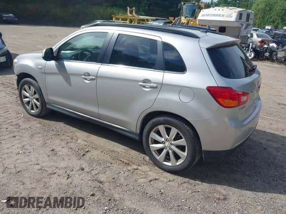 2013 Mitsubishi Outlander SE with VIN 4A4AR4AU3DE002006, listed as a IAAI auction lot 43009482 with 212,901 mi miles and . Bid and sale history available at DreamBid. Image 3.