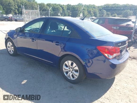 ✅ 2013 Chevrolet Cruze LS • VIN: 1G1PA5SH7D7185147 • Lot: 43296228. Listed on IAAI with 127,952 mi. Free auction sales archive from the USA and detailed vehicle history report at DreamBid. Image 3.