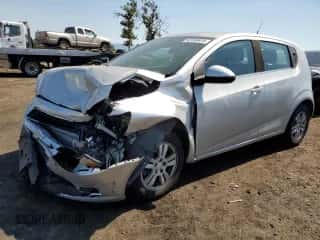 2014 Chevrolet Sonic LT с VIN 1G1JC6SH9E4242151, выставлен на аукционе Copart как лот 62490424 с пробегом 165 435 миль миль и Списание • Salvage title. История ставок и продаж доступна на DreamBid. Изображение 1.