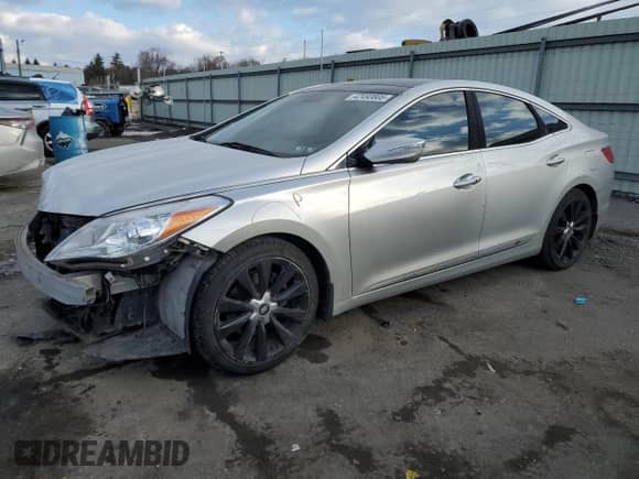 2013 Hyundai Azera z VIN KMHFH4JG5DA300781, wystawiony jako Copart lot #42493805 z przebiegiem 165 673 mil mil oraz Szkoda całkowita • Salvage title. Historia ofert i sprzedaży dostępna na DreamBid. Obrazek 1.