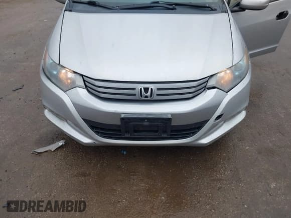 ✅ 2010 Honda Insight LX • VIN: JHMZE2H54AS029462 • Lot: 43806001. Listed on IAAI with 121,625 mi. Free auction sales archive from the USA and detailed vehicle history report at DreamBid. Image 6.