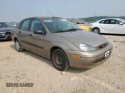 ✅ 2004 Ford Focus LX • VIN: 1FAFP33P94W121604 • Лот: 67125185. Опубликован ранее на Copart с пробегом 104 327 миль. Бесплатный доступ к архиву аукционных продаж из США и подробный отчёт об истории автомобиля на DreamBid. Изображение 4.