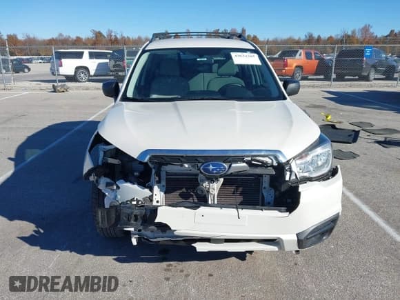 ✅ 2018 Subaru Forester • VIN: JF2SJABC7JH543921 • Lot: 43634385. Listed on IAAI with 100,699 mi. Free auction sales archive from the USA and detailed vehicle history report at DreamBid. Image 13.