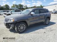 ✅ 2015 Jeep Grand Cherokee Limited • VIN: 1C4RJEBGXFC737211 • Lot: 70911715. Listed on Copart with 243,640 mi. Free auction sales archive from the USA and detailed vehicle history report at DreamBid. Image 1.