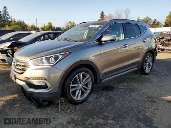 2017 Hyundai Santa Fe 2.0T with VIN 5XYZUDLAXHG453538, listed as a Copart auction lot 69907165 with 102,694 mi miles and Salvage title. Bid and sale history available at DreamBid. Image 1.