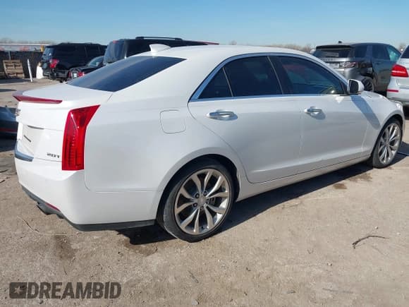 ✅ 2015 Cadillac ATS Performance RWD • VIN: 1G6AC5SX4F0113027 • Лот: 41307410. Опубликован ранее на IAAI с пробегом 125 336 миль. Бесплатный доступ к архиву аукционных продаж из США и подробный отчёт об истории автомобиля на DreamBid. Изображение 4.