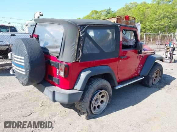 ✅ 2007 Jeep Wrangler X • VIN: 1J4FA24177L229123 • Lot: 42199959. Listed on IAAI with 78,506 mi. Free auction sales archive from the USA and detailed vehicle history report at DreamBid. Image 4.
