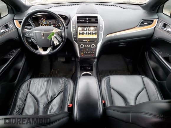 ✅ 2017 Lincoln MKC Select • VIN: 5LMCJ2D93HUL07660 • Lot: 90562015. Listed on Copart with 128,485 mi. Free auction sales archive from the USA and detailed vehicle history report at DreamBid. Image 8.