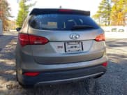 ✅ 2015 Hyundai Santa Fe • VIN: 5XYZTDLB4FG282648 • Лот: 43621938. Опубликован ранее на IAAI с пробегом 162 620 миль. Бесплатный доступ к архиву аукционных продаж из США и подробный отчёт об истории автомобиля на DreamBid. Изображение 6.