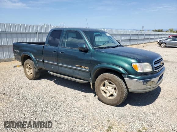 ✅ 2000 Toyota Tundra Limited • VIN: 5TBBT4812YS023754 • Lot: 70510055. Listed on Copart with 214,473 mi. Free auction sales archive from the USA and detailed vehicle history report at DreamBid. Image 4.
