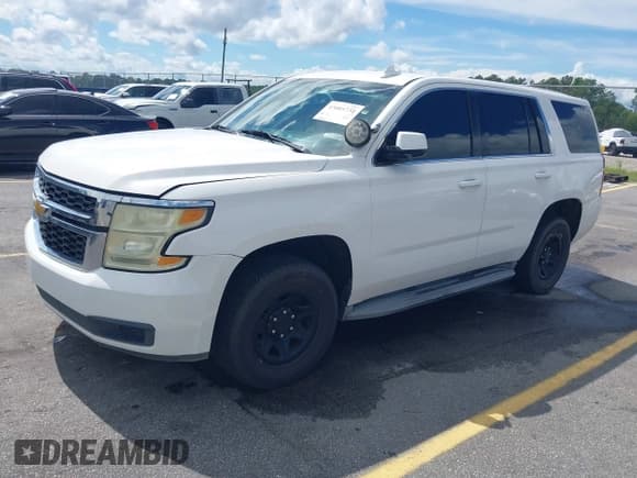 ✅ 2015 Chevrolet Tahoe Commercial • VIN: 1GNLC2EC4FR590301 • Lot: 43005734. Listed on IAAI with 208,347 mi. Free auction sales archive from the USA and detailed vehicle history report at DreamBid. Image 17.