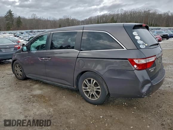 ✅ 2013 Honda Odyssey EX • VIN: 5FNRL5H40DB061262 • Lot: 95397725. Listed on Copart with 232,178 mi. Free auction sales archive from the USA and detailed vehicle history report at DreamBid. Image 2.