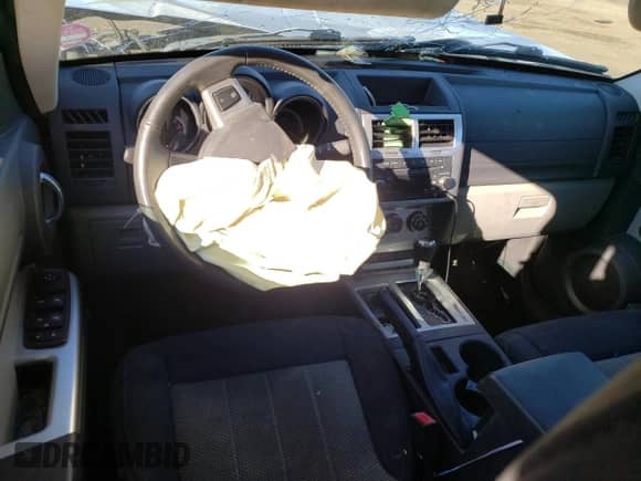 2010 Dodge Nitro SXT z VIN 1D4PU5GK3AW134705, wystawiony jako Copart lot #79857434 z przebiegiem Nie podano mil oraz Szkoda całkowita • Salvage title. Historia ofert i sprzedaży dostępna na DreamBid. Obrazek 8.