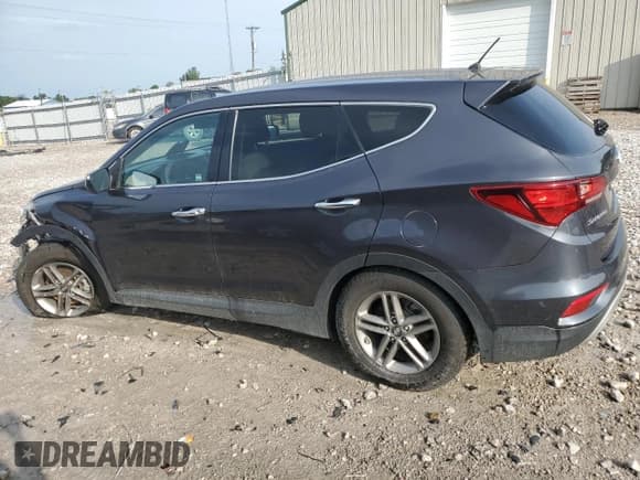 ✅ 2018 Hyundai Santa Fe 2.4L • VIN: 5XYZTDLB8JG569810 • Лот: 67123594. Опубликован ранее на Copart с пробегом 110 374 миль. Бесплатный доступ к архиву аукционных продаж из США и подробный отчёт об истории автомобиля на DreamBid. Изображение 2.