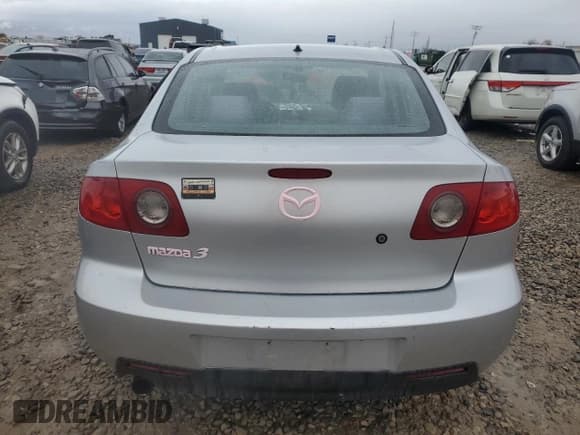 ✅ 2005 Mazda 3 i • VIN: JM1BK12F051320205 • Лот: 86398754. Опубликован ранее на Copart с пробегом Не указан. Бесплатный доступ к архиву аукционных продаж из США и подробный отчёт об истории автомобиля на DreamBid. Изображение 6.