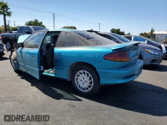 ✅ 1995 Saturn SC • VIN: 1G8ZE1280SZ225870 • Lot: 67038365. Listed on Copart with 272,917 mi. Free auction sales archive from the USA and detailed vehicle history report at DreamBid. Image 2.