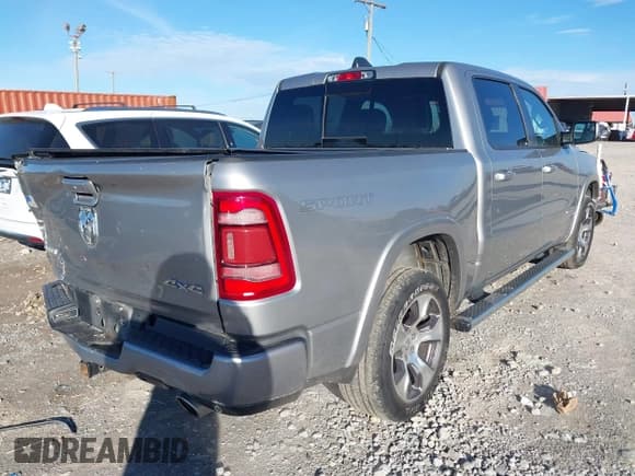 ✅ 2022 Ram 1500 Laramie • VIN: 1C6SRFJT5NN140640 • Lot: 43617465. Listed on IAAI with 53,214 mi. Free auction sales archive from the USA and detailed vehicle history report at DreamBid. Image 4.