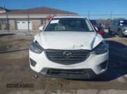 ✅ 2016 Mazda CX-5 Grand Touring • VIN: JM3KE4DY6G0864294 • Lot: 43639964. Wystawiony na IAAI z przebiegiem 119 285 mil. Bezpłatny archiwum sprzedaży aukcyjnych z USA i szczegółowy raport historii pojazdu na DreamBid. Zdjęcie 12.