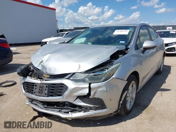 ✅ 2018 Chevrolet Cruze LT • VIN: 1G1BE5SMXJ7154272 • Lot: 43288169. Listed on IAAI with 109,393 mi. Free auction sales archive from the USA and detailed vehicle history report at DreamBid. Image 2.