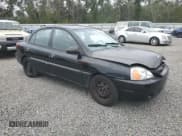 ✅ 2004 Kia Rio • VIN: KNADC125046349408 • Lot: 79868034. Listed on Copart with 97,450 mi. Free auction sales archive from the USA and detailed vehicle history report at DreamBid. Image 4.