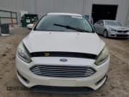 ✅ 2016 Ford Focus Titanium • VIN: 1FADP3N27GL242243 • Лот: 90424575. Опубликован ранее на Copart с пробегом 58 813 миль. Бесплатный доступ к архиву аукционных продаж из США и подробный отчёт об истории автомобиля на DreamBid. Изображение 5.