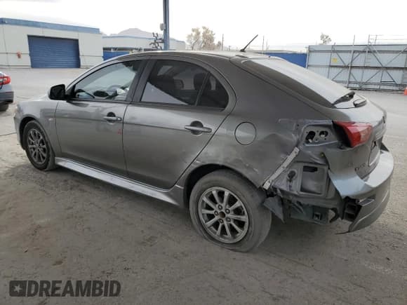 ✅ 2014 Mitsubishi Lancer ES • VIN: JA32X2HU9EU017031 • Lot: 84561104. Listed on Copart with 85,983 mi. Free auction sales archive from the USA and detailed vehicle history report at DreamBid. Image 2.