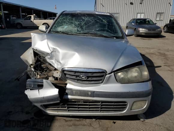 2002 Hyundai Elantra GT z VIN KMHDN55DX2U069068, wystawiony jako Copart lot #73525214 z przebiegiem 195 048 mil mil oraz Szkoda całkowita • Salvage title. Historia ofert i sprzedaży dostępna na DreamBid. Obrazek 5.