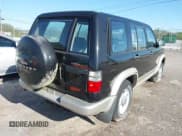 ✅ 2000 Isuzu Trooper S • VIN: JACDJ58X7Y7J06010 • Lot: 42002763. Listed on IAAI with 165,285 mi. Free auction sales archive from the USA and detailed vehicle history report at DreamBid. Image 4.