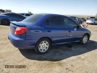 ✅ 2002 Kia Rio • VIN: KNADC123X26125297 • Lot: 74368764. Listed on Copart with 72,025 mi. Free auction sales archive from the USA and detailed vehicle history report at DreamBid. Image 3.