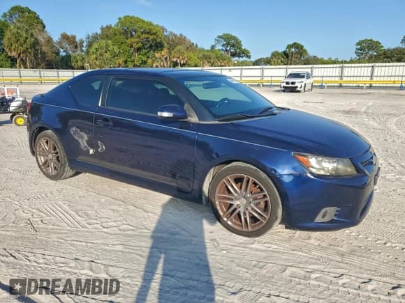 ✅ 2011 Scion tC • VIN: JTKJF5C74B3008430 • Lot: 94751795. Listed on Copart with 159,327 mi. Free auction sales archive from the USA and detailed vehicle history report at DreamBid. Image 4.