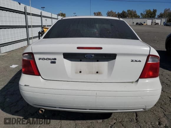 ✅ 2005 Ford Focus S • VIN: 1FAFP34N35W253238 • Lot: 91303485. Listed on Copart with 277,357 mi. Free auction sales archive from the USA and detailed vehicle history report at DreamBid. Image 6.