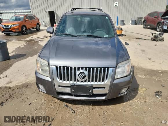 2010 Mercury Mariner Premier с VIN 4M2CN9HG9AKJ15491, выставлен на аукционе Copart как лот 70665985 с пробегом 198 092 миль миль и На запчасти • Non repairable. История ставок и продаж доступна на DreamBid. Изображение 5.