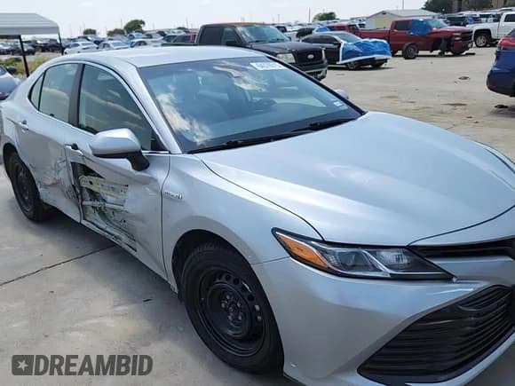 ✅ 2020 Toyota Camry Hybrid LE • VIN: 4T1C31AKXLU018881 • Лот: 64376515. Опубликован ранее на Copart с пробегом 221 603 миль. Бесплатный доступ к архиву аукционных продаж из США и подробный отчёт об истории автомобиля на DreamBid. Изображение 14.