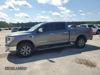 ✅ 2018 Nissan Titan Platinum Reserve • VIN: 1N6BA1F46JN518038 • Lot: 61191525. Wystawiony na Copart z przebiegiem 123 846 mil. Bezpłatny archiwum sprzedaży aukcyjnych z USA i szczegółowy raport historii pojazdu na DreamBid. Zdjęcie 1.