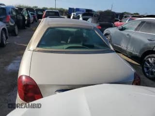 ✅ 2002 Lincoln Continental • VIN: 1LNHM97V32Y694132 • Lot: 76410144. Wystawiony na Copart z przebiegiem Nie podano. Bezpłatny archiwum sprzedaży aukcyjnych z USA i szczegółowy raport historii pojazdu na DreamBid. Zdjęcie 6.