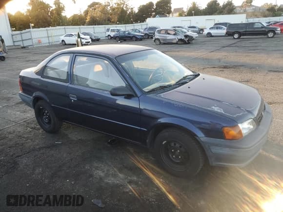 ✅ 1996 Toyota Tercel DX • VIN: JT2AC52L5T0190097 • Lot: 76574844. Wystawiony na Copart z przebiegiem 175 256 mil. Bezpłatny archiwum sprzedaży aukcyjnych z USA i szczegółowy raport historii pojazdu na DreamBid. Zdjęcie 4.