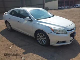 ✅ 2014 Chevrolet Malibu LTZ • VIN: 1G11H5SL2EF184727 • Lot: 43242461. Listed on IAAI with 195,712 mi. Free auction sales archive from the USA and detailed vehicle history report at DreamBid. Image 1.